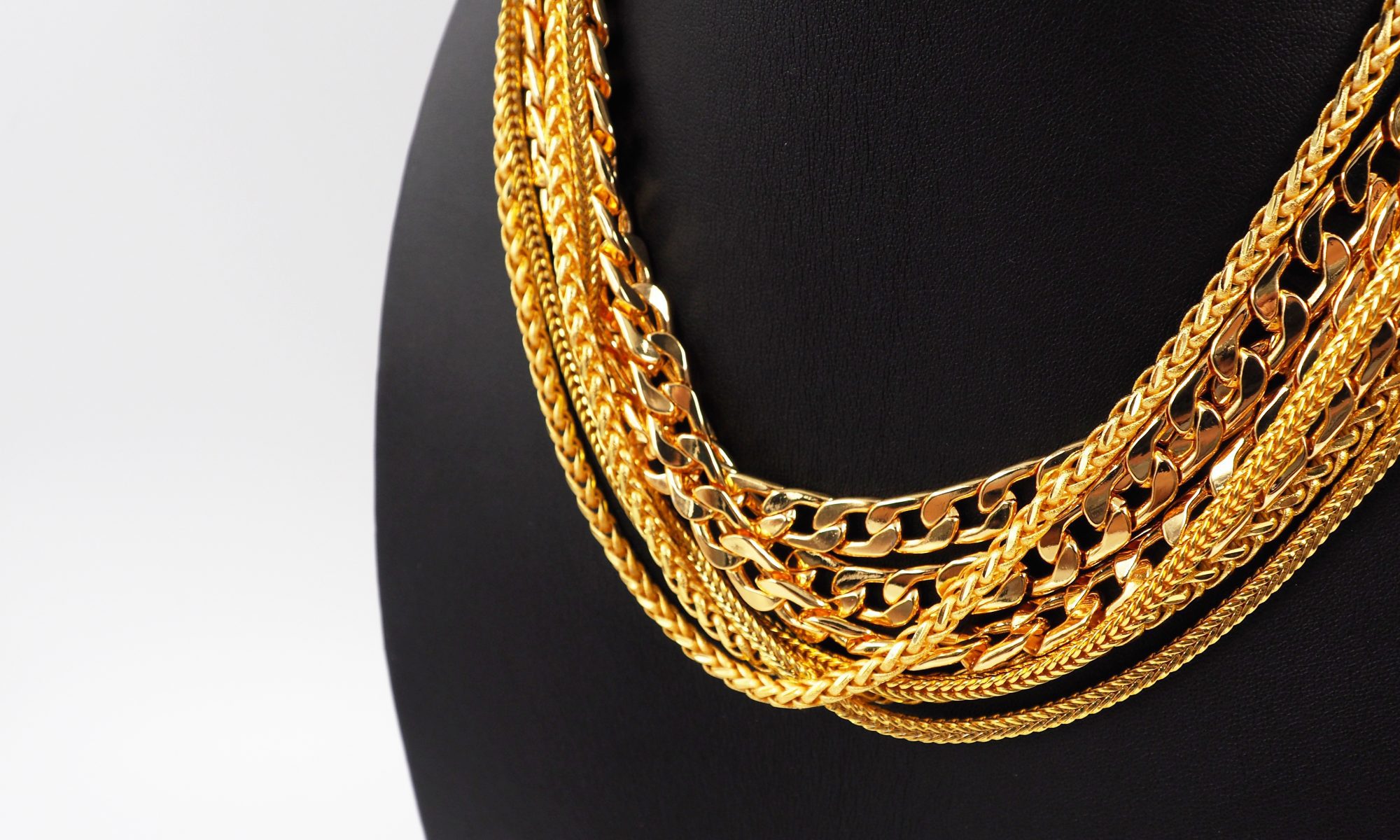 Gold necklaces on stand available to purchase at Gold Necklaces Jewelry store in Merrillville