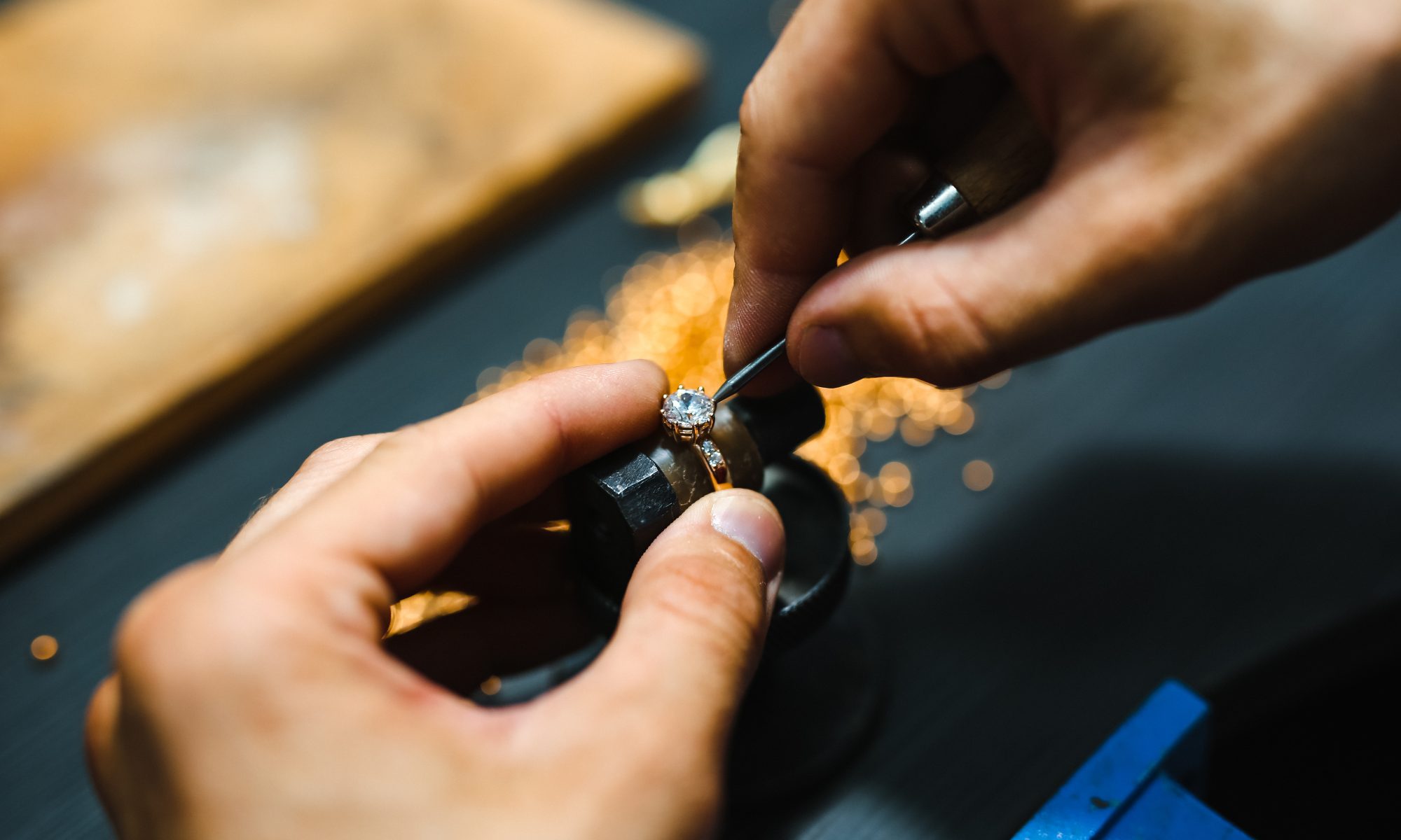 Fixing a ring's prongs to represent Jewelry Repair Lakes of the Four Seasons.